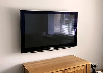 Wall mounted Panasonic TV