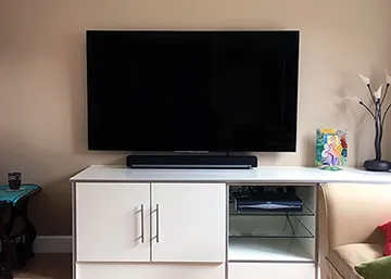 Wall mounted Sony TV and Sonos soundbar